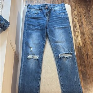 Blue Skinny Jeans with Distressed Details and Fading